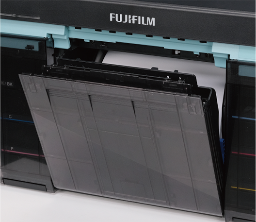 Front cover and paper dust bin integrated on the FUJIFILM Frontier DX400W for easy scrap paper disposal