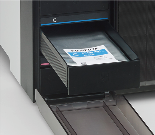 Slide out the DX400W tray to replace the ink supply unit
